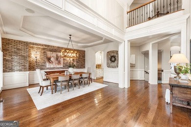 An exceptional entry point into The Manor Golf & Country Club on Manor Golf and Country Club in Georgia - for sale on GolfHomes.com, golf home, golf lot