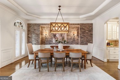 An exceptional entry point into The Manor Golf & Country Club on Manor Golf and Country Club in Georgia - for sale on GolfHomes.com, golf home, golf lot