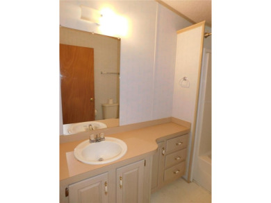 BIG PRICE DROP!!! Save money by making minor renovations on Largo Golf Course in Florida - for sale on GolfHomes.com, golf home, golf lot