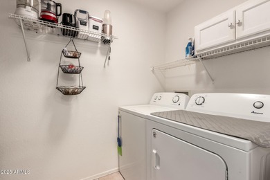 Single-story home on a premium corner lot with a pool in Johnson on The Golf Club At Johnson Ranch in Arizona - for sale on GolfHomes.com, golf home, golf lot