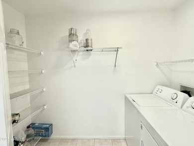 Single-story home on a premium corner lot with a pool in Johnson on The Golf Club At Johnson Ranch in Arizona - for sale on GolfHomes.com, golf home, golf lot