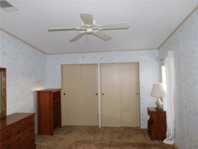 BIG PRICE DROP!!! Save money by making minor renovations on Largo Golf Course in Florida - for sale on GolfHomes.com, golf home, golf lot