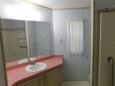 BIG PRICE DROP!!! Save money by making minor renovations on Largo Golf Course in Florida - for sale on GolfHomes.com, golf home, golf lot