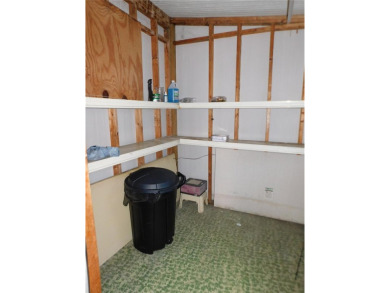 BIG PRICE DROP!!! Save money by making minor renovations on Largo Golf Course in Florida - for sale on GolfHomes.com, golf home, golf lot