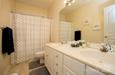 Magnificently updated ranch home built to entertain -- in the on Highland Creek Golf Club in North Carolina - for sale on GolfHomes.com, golf home, golf lot