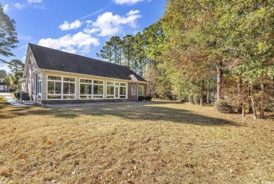 This home is the Wilmington floor plan with modifications on Barefoot Resort and Golf Club  in South Carolina - for sale on GolfHomes.com, golf home, golf lot