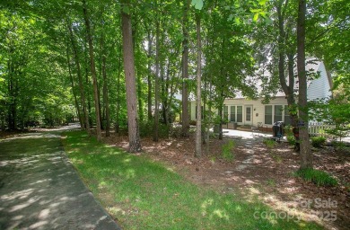 Magnificently updated ranch home built to entertain -- in the on Highland Creek Golf Club in North Carolina - for sale on GolfHomes.com, golf home, golf lot