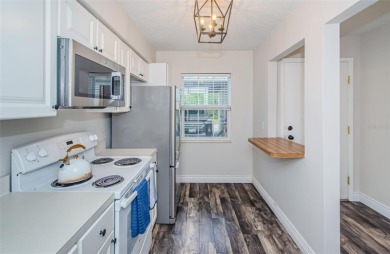 Welcome to low-maintenance Florida living in the guard-gated on Seven Springs Golf and Country Club in Florida - for sale on GolfHomes.com, golf home, golf lot