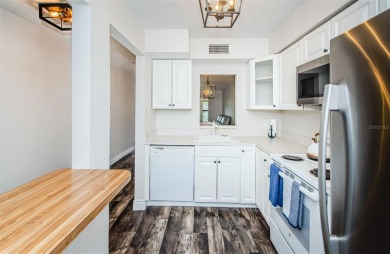 Welcome to low-maintenance Florida living in the guard-gated on Seven Springs Golf and Country Club in Florida - for sale on GolfHomes.com, golf home, golf lot