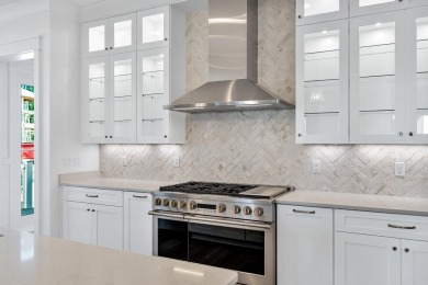 This thoughtfully designed expanded Coral Bean plan by Huff on Origins Golf Club in Florida - for sale on GolfHomes.com, golf home, golf lot