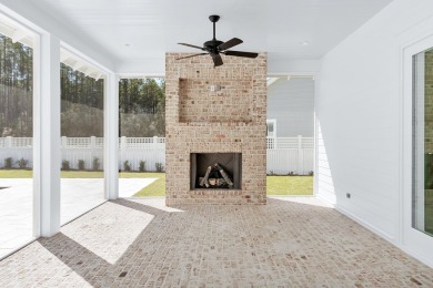 This thoughtfully designed expanded Coral Bean plan by Huff on Origins Golf Club in Florida - for sale on GolfHomes.com, golf home, golf lot