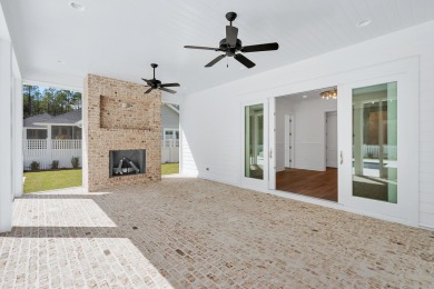This thoughtfully designed expanded Coral Bean plan by Huff on Origins Golf Club in Florida - for sale on GolfHomes.com, golf home, golf lot