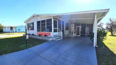 Welcome to paradise in this stunning 2-bedroom, 2-bathroom home on Blue Heron Pines Golf Course in Florida - for sale on GolfHomes.com, golf home, golf lot