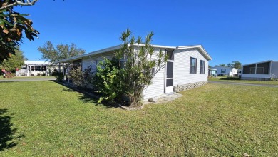 Welcome to paradise in this stunning 2-bedroom, 2-bathroom home on Blue Heron Pines Golf Course in Florida - for sale on GolfHomes.com, golf home, golf lot