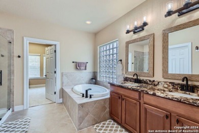 Welcome to this luxurious home that shows like a model in The on Cedar Creek Golf Course in Texas - for sale on GolfHomes.com, golf home, golf lot