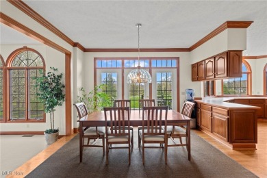 Nestled on the 5th hole of Barrington Golf Course, this brick on Barrington Golf Club in Ohio - for sale on GolfHomes.com, golf home, golf lot