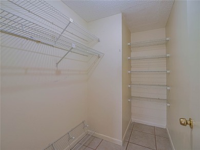 First floor!  Washer and Dryer included in sale and in closet on Vero Beach South Golf Course in Florida - for sale on GolfHomes.com, golf home, golf lot