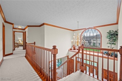 Nestled on the 5th hole of Barrington Golf Course, this brick on Barrington Golf Club in Ohio - for sale on GolfHomes.com, golf home, golf lot