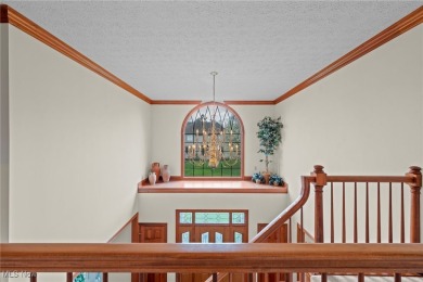 Nestled on the 5th hole of Barrington Golf Course, this brick on Barrington Golf Club in Ohio - for sale on GolfHomes.com, golf home, golf lot