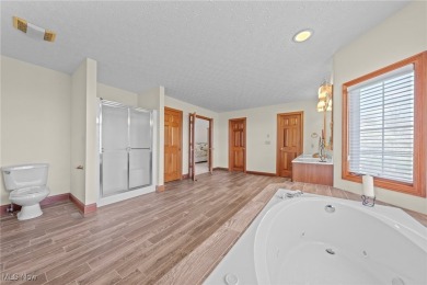 Nestled on the 5th hole of Barrington Golf Course, this brick on Barrington Golf Club in Ohio - for sale on GolfHomes.com, golf home, golf lot