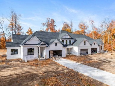 Discover luxury living at 809 Fairways Drive. Located in the on Birchwood Farms Golf and Country Club in Michigan - for sale on GolfHomes.com, golf home, golf lot