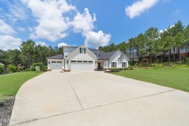 From the moment you arrive at this residence, you will know that on Canongate At Healy Point Country Club in Georgia - for sale on GolfHomes.com, golf home, golf lot