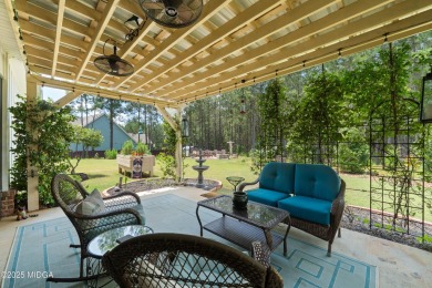 From the moment you arrive at this residence, you will know that on Canongate At Healy Point Country Club in Georgia - for sale on GolfHomes.com, golf home, golf lot