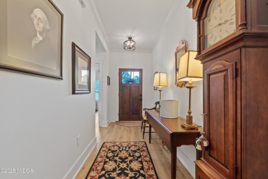 From the moment you arrive at this residence, you will know that on Canongate At Healy Point Country Club in Georgia - for sale on GolfHomes.com, golf home, golf lot