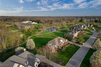Nestled on the 5th hole of Barrington Golf Course, this brick on Barrington Golf Club in Ohio - for sale on GolfHomes.com, golf home, golf lot