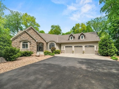 This custom-built, one-level home sits on 2.5 beautifully on Ridges At Sand Creek in Minnesota - for sale on GolfHomes.com, golf home, golf lot