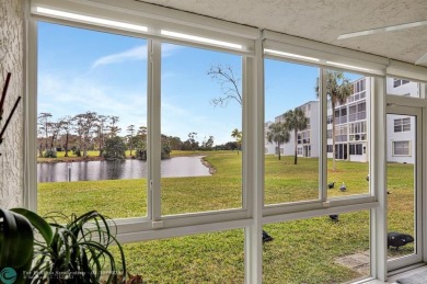 COME SEE THIS BEAUTIFUL GROUND FLOOR 2 BEDROOM 2 BATH HOME IN on  in Florida - for sale on GolfHomes.com, golf home, golf lot