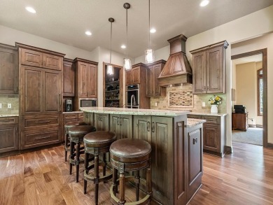 This custom-built, one-level home sits on 2.5 beautifully on Ridges At Sand Creek in Minnesota - for sale on GolfHomes.com, golf home, golf lot