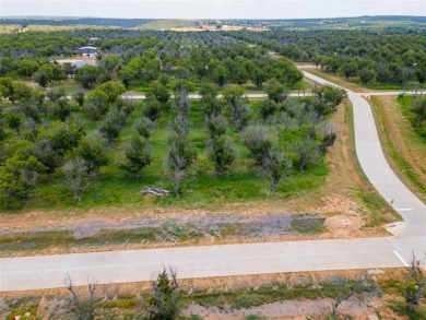 This 1.6 acre corner lot offers an exceptional opportunity to on Pecan Plantation Country Club in Texas - for sale on GolfHomes.com, golf home, golf lot