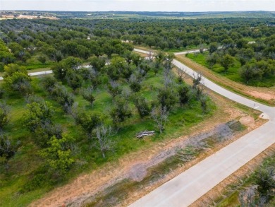 This 1.6 acre corner lot offers an exceptional opportunity to on Pecan Plantation Country Club in Texas - for sale on GolfHomes.com, golf home, golf lot