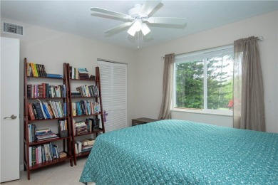 Wonderful first-floor charmer in Pelican Pointe, a river-access on Pelican Pointe 9 Hole Course in Florida - for sale on GolfHomes.com, golf home, golf lot