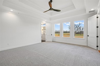 Experience refined living in this Modified Bodega Signature on Pecan Plantation Country Club in Texas - for sale on GolfHomes.com, golf home, golf lot