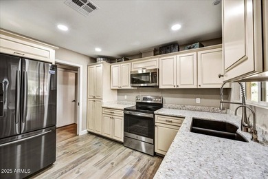 Beautifully renovated San Franciscan on a quiet cul-de-sac at on Briarwood Country Club in Arizona - for sale on GolfHomes.com, golf home, golf lot