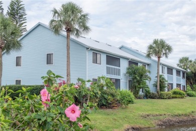 Wonderful first-floor charmer in Pelican Pointe, a river-access on Pelican Pointe 9 Hole Course in Florida - for sale on GolfHomes.com, golf home, golf lot