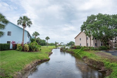 Wonderful first-floor charmer in Pelican Pointe, a river-access on Pelican Pointe 9 Hole Course in Florida - for sale on GolfHomes.com, golf home, golf lot