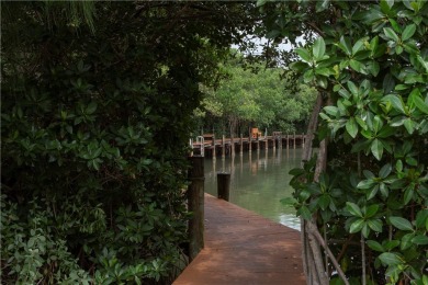 Wonderful first-floor charmer in Pelican Pointe, a river-access on Pelican Pointe 9 Hole Course in Florida - for sale on GolfHomes.com, golf home, golf lot