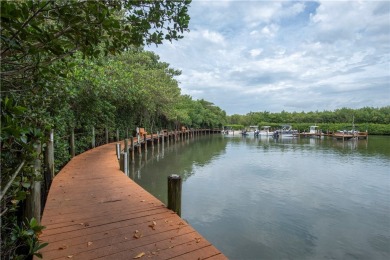 Wonderful first-floor charmer in Pelican Pointe, a river-access on Pelican Pointe 9 Hole Course in Florida - for sale on GolfHomes.com, golf home, golf lot
