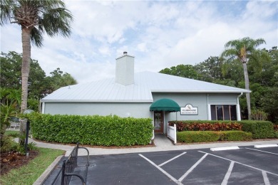 Wonderful first-floor charmer in Pelican Pointe, a river-access on Pelican Pointe 9 Hole Course in Florida - for sale on GolfHomes.com, golf home, golf lot