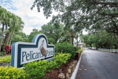 Wonderful first-floor charmer in Pelican Pointe, a river-access on Pelican Pointe 9 Hole Course in Florida - for sale on GolfHomes.com, golf home, golf lot