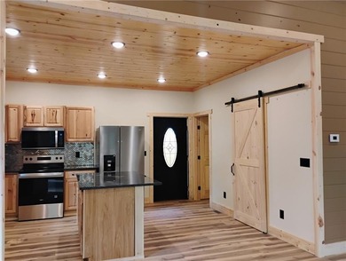 Contemporary Rustic Retreat in Coosawattee River Resort, Welcome on White Path Golf Club in Georgia - for sale on GolfHomes.com, golf home, golf lot