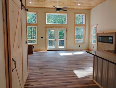 Contemporary Rustic Retreat in Coosawattee River Resort, Welcome on White Path Golf Club in Georgia - for sale on GolfHomes.com, golf home, golf lot