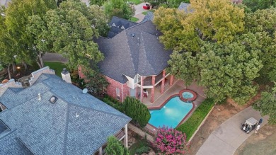 This exceptional golf course custom home features striking curb on Walnut Creek Country Club in Texas - for sale on GolfHomes.com, golf home, golf lot