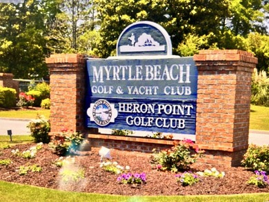 Forget the search--you've just found the one. Tucked away in the on Heron Point Golf Club in South Carolina - for sale on GolfHomes.com, golf home, golf lot