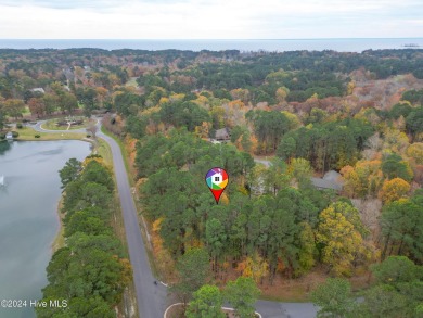 Immaculate, custom build, home in the gated, waterfront, golf on Sound Golf Links at Albemarle Plantation in North Carolina - for sale on GolfHomes.com, golf home, golf lot