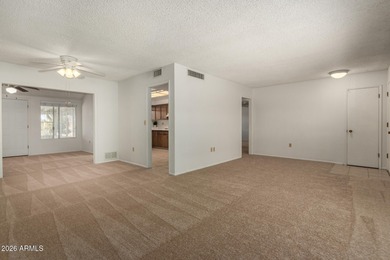 Welcome home to this light and bright 2-bedroom, 2-bath home on Sun City Lakes West and East in Arizona - for sale on GolfHomes.com, golf home, golf lot