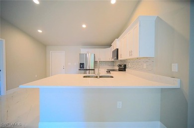 Discover the exceptional quality of this BRAND NEW CONSTRUCTION on Mirror Lakes Golf Club in Florida - for sale on GolfHomes.com, golf home, golf lot